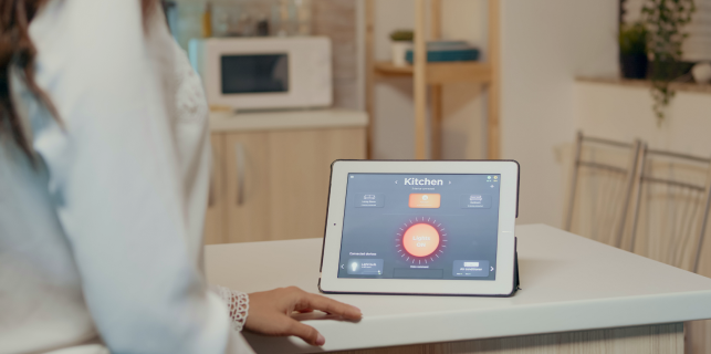 A tablet on the tabe with control UI
