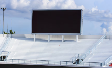 LED digital signage display in a modern stadium for live broadcasts and updates