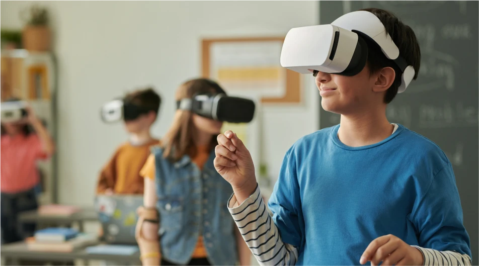 Students exploring virtual reality in a classroom wearing VR headsets and interacting with immersive educational content