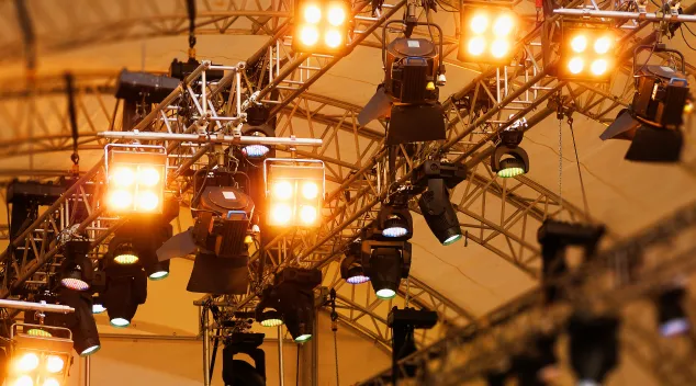 Stage lighting solutions with professional rigged spotlights for events and auditoriums