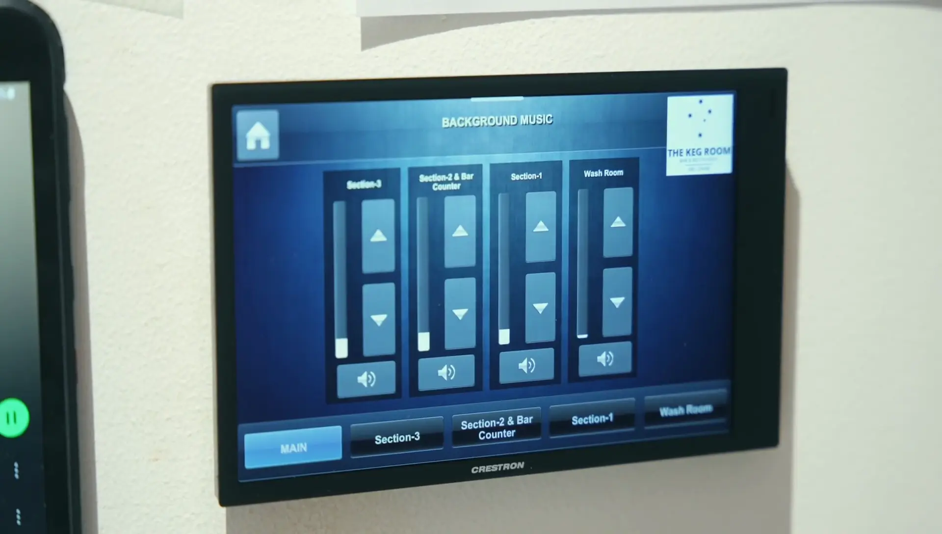 Premium Restaurant Bgm System With Zone Control For Keg Room, Abu Dhabi 9 Crestron TSW-770-B-S touch panel installed by Oxford Integration for multi-zone BGM control at KEG Room Restaurant Abu Dhabi
