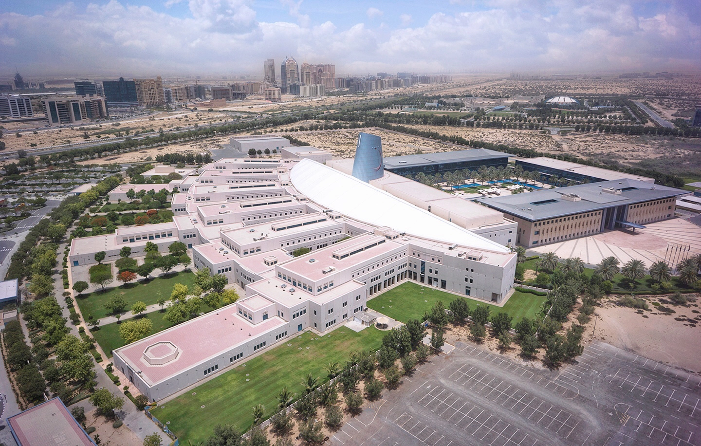 Aerial view of Zayed University Dubai campus and its surrounding buildings
